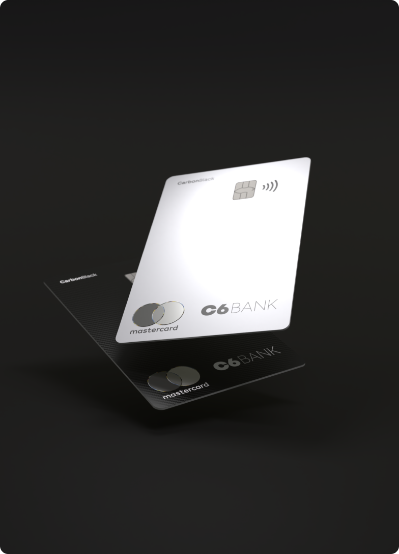 Dois cartões C6 Carbon flutuam sobre fundo preto, com destaque para o modelo Silver.