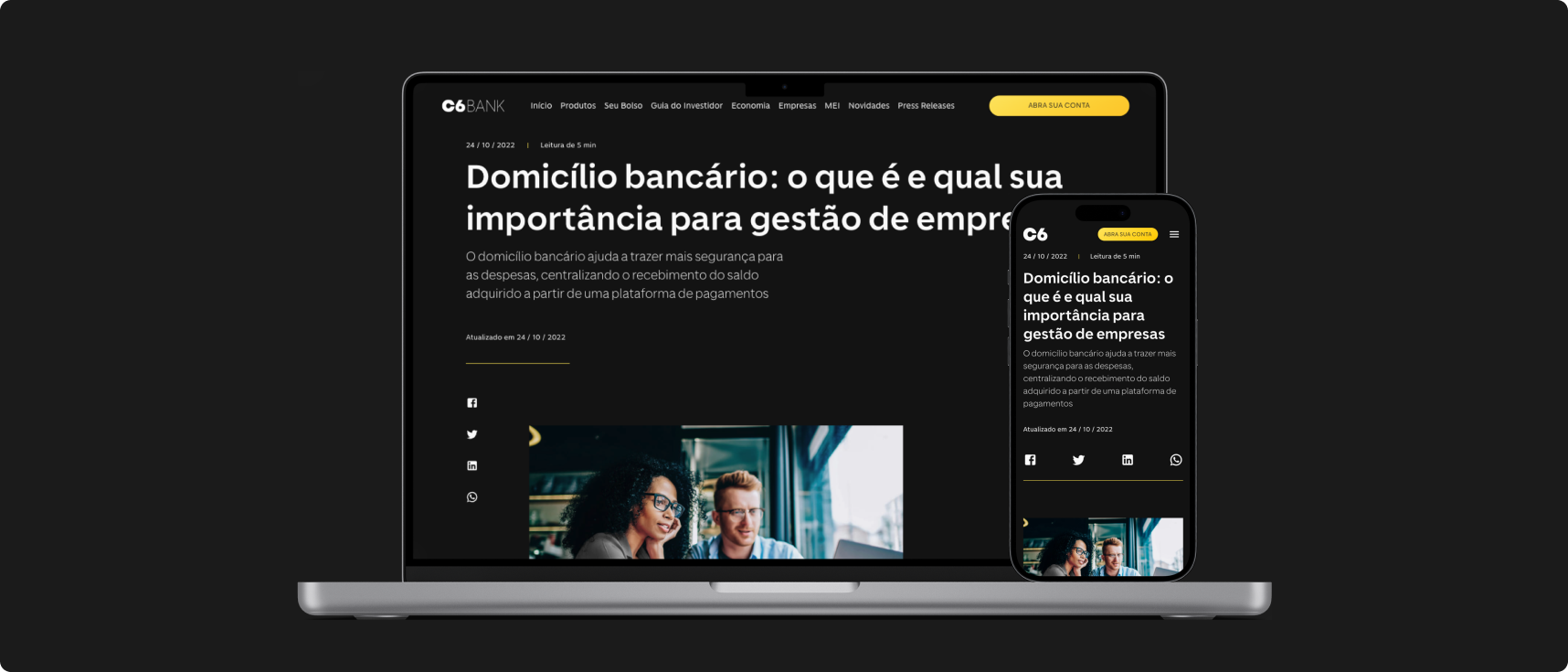 Notebook e celular abertos no blog do C6 Bank na matéria de domicílio bancário