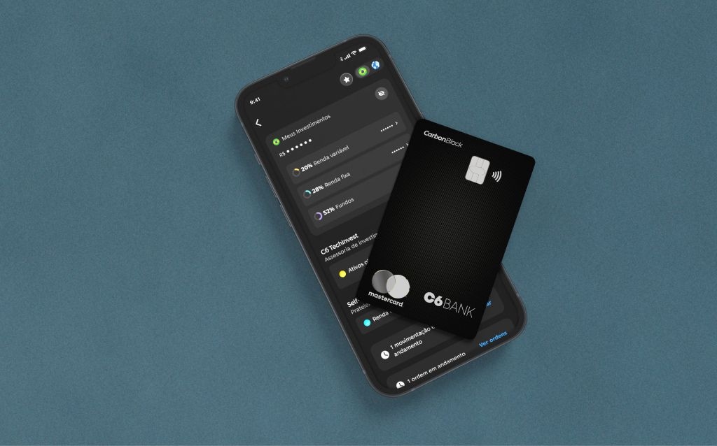 como usar nfc no celular - cartão black do c6 bank preto em cima do celular aberto no app do banco